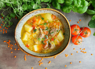 Lentil soup with meat and potatoes
