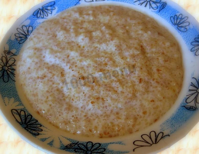 Wheat porridge on water with butter in a slow cooker