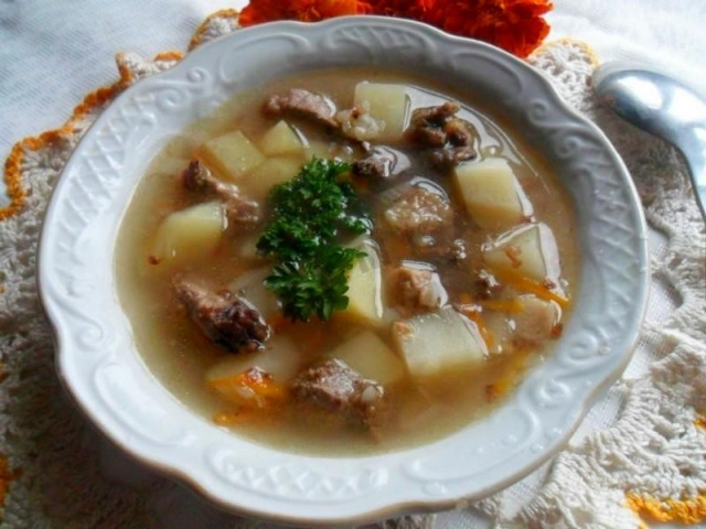 Soup with meat in a slow cooker