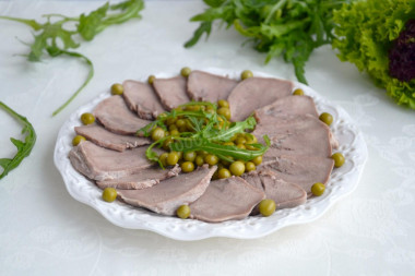 Pork tongue in a slow cooker