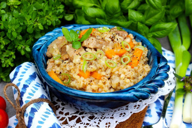 Pearl barley porridge with meat in slow cooker