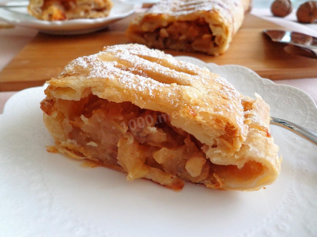 Strudel in a slow cooker made of puff pastry with apples