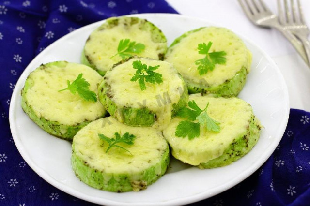 Zucchini baked with cheese in a slow cooker