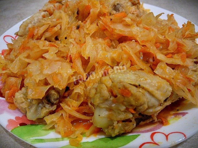 Stewed cabbage with carrots onion wings in slow cooker