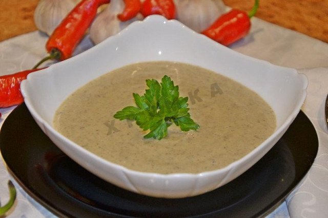 Mushroom soup puree in a slow cooker of champignons