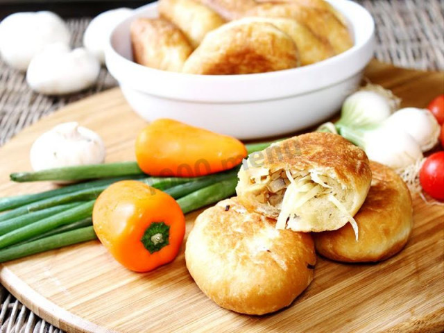 Dough pies for mayonnaise with mushrooms, cabbage and onions