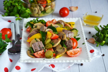 Salad with meat, mushrooms and cucumbers