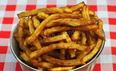 French fries in a wok pan