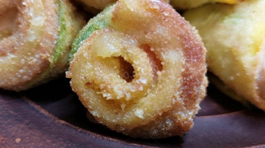 Juicy zucchini rolls with ham in deep-fried
