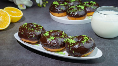 Doughnuts made of yeast dough in chocolate glaze