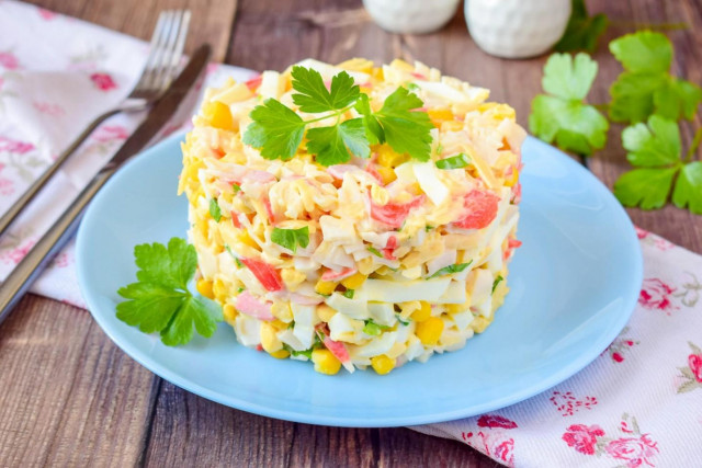 Salad with crab sticks, corn and cheese