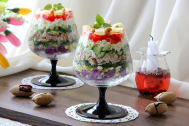 Layered salad with chicken and pineapples