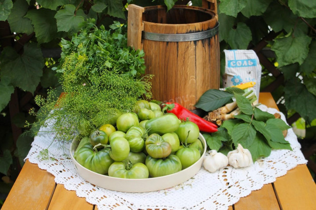 Green tomatoes in a barrel for winter