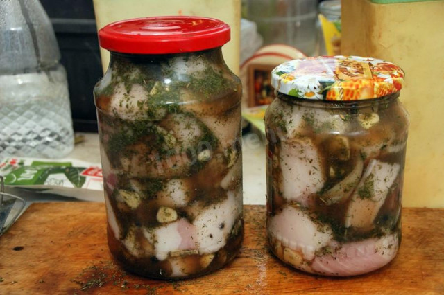 Lard in a jar with hot brine