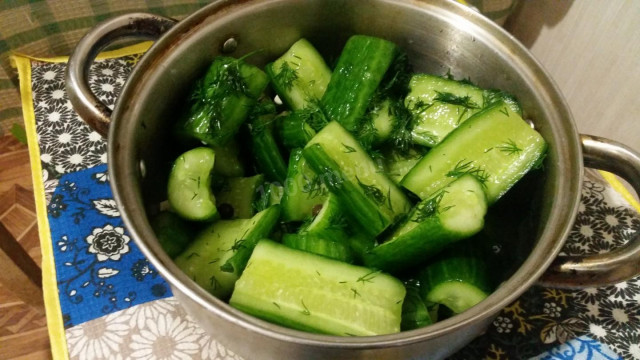 Lightly salted cucumbers in a package both in winter and summer