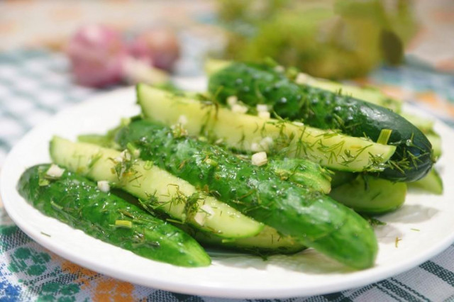 Cucumbers with dill and garlic in lime juice in a bag