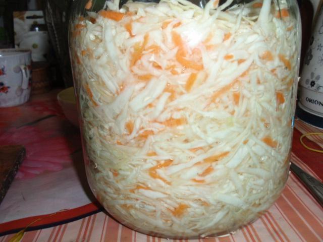 Sauerkraut without vinegar in a jar for winter in brine