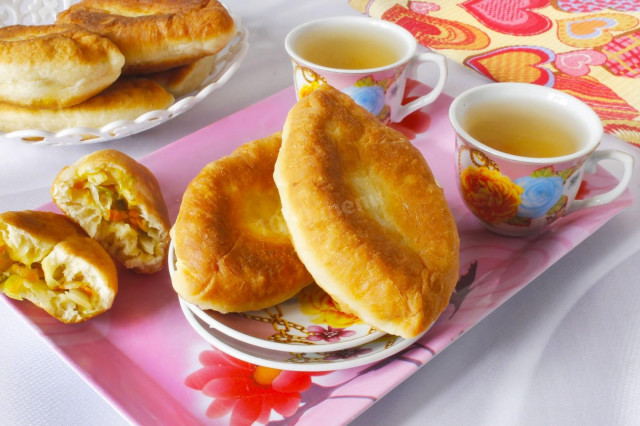 Pies with cabbage on kefir fried in a frying pan