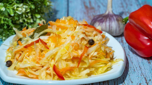 Pickled cabbage salad with carrots and garlic