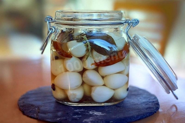 Garlic pickled with chili pepper