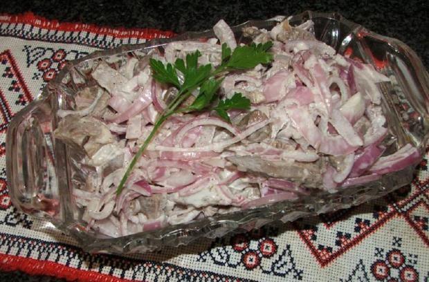 Salad with tongue and pickled mushrooms