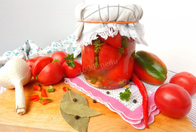 Tomatoes stuffed with garlic, herbs and pepper for winter