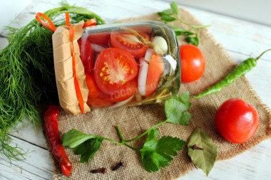 Tomatoes in halves with onions and butter for winter