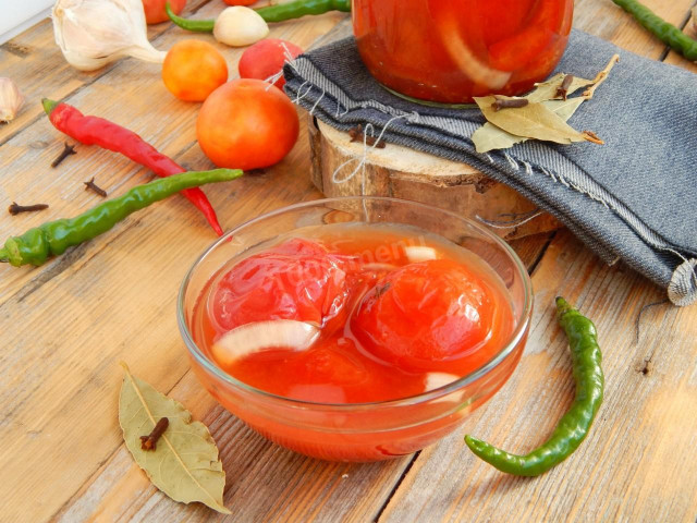 Tomatoes in their own juice in tomato paste for winter