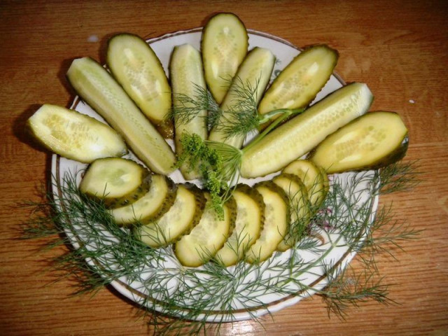 Lightly salted cucumbers with horseradish and garlic