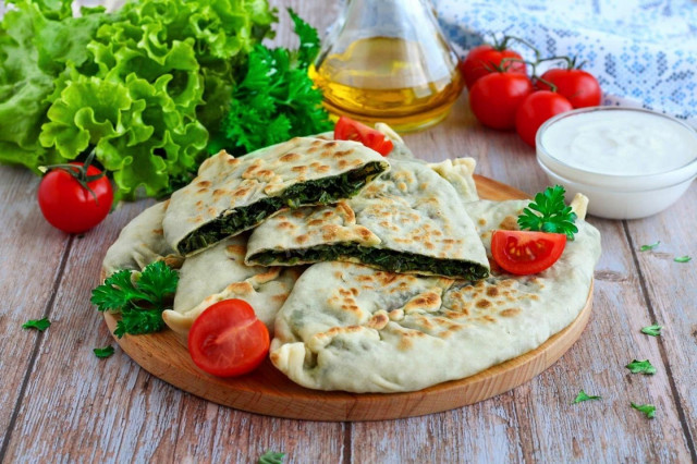 Tortillas with herbs in a frying pan