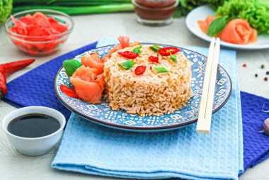 Rice with soy sauce in a frying pan