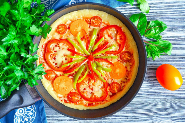 Pizza in a frying pan without sour cream and kefir in 10 minutes