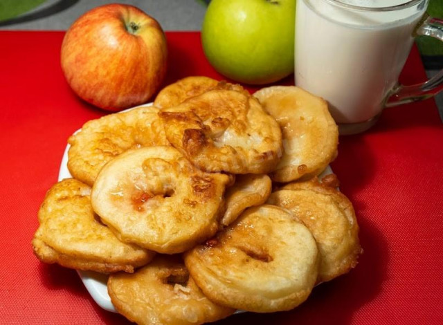 Dessert pancakes with apples in batter