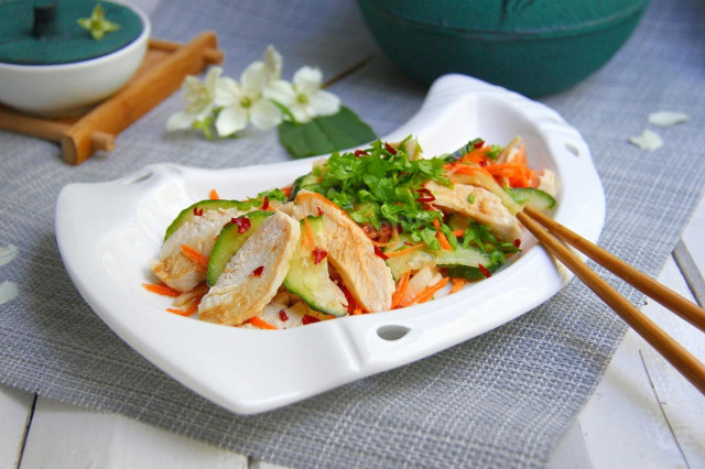 Korean salad with cucumbers and chicken
