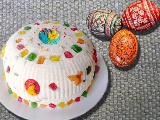 Easter with candied fruits and dried fruits on egg yolks