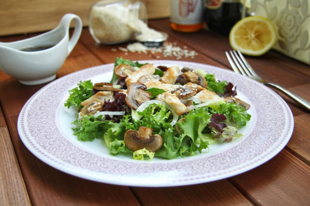 Salad with fried mushrooms cucumber and chicken without mayonnaise