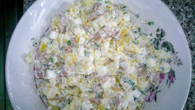 Salad with potatoes and canned squid