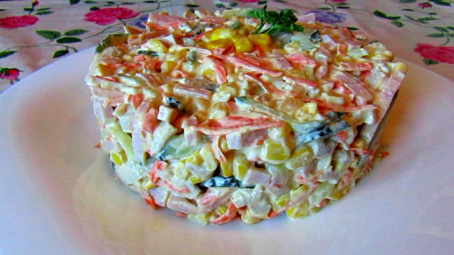 Salad with chicken, ham and vegetables