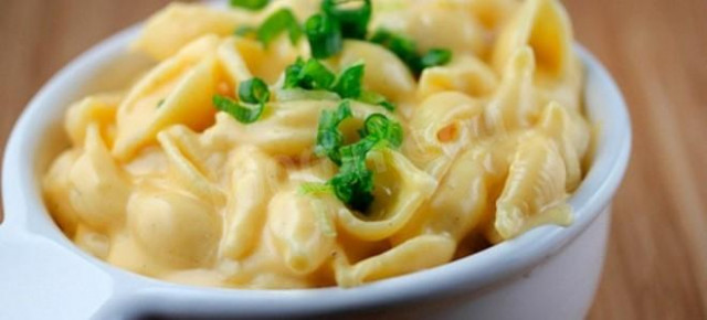 Macaroni with cheese and milk in the microwave