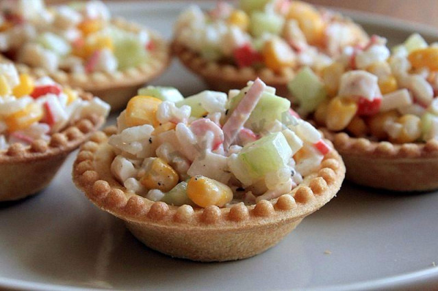 Tartlets with crab sticks corn and cucumber