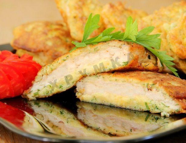 Chicken breast chops with hard cheese and mayonnaise