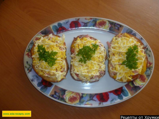 Hot sandwiches with cheese and sausage in the microwave