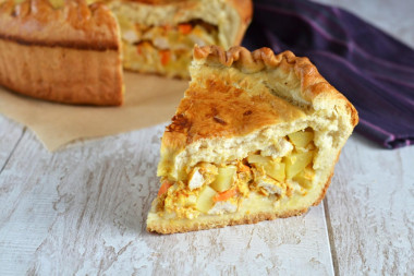 Pie with chicken and potatoes from yeast dough