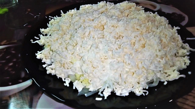 French salad melted cheese with mayonnaise and egg