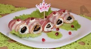 Bacon rolls with prunes cheese and walnuts
