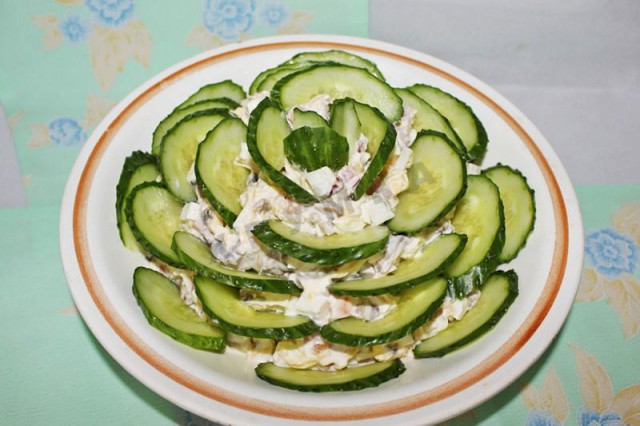 Salad with mushrooms cucumber egg ham and cheese