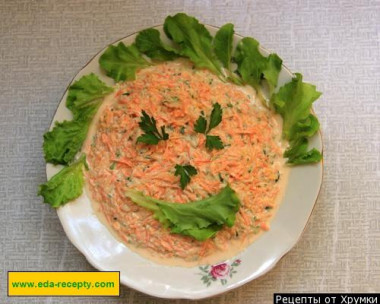 Raw pumpkin salad with cucumbers and carrots hastily