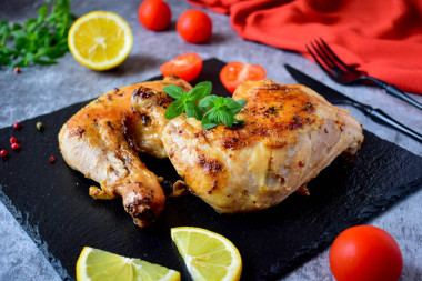 Fried chicken in a frying pan