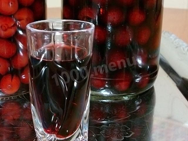 Homemade cherry liqueur with cherry pits
