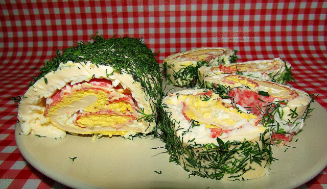 Processed cheese roll with salami and eggs